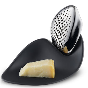 Cheese grater in 18/10 stainless steel with base in melamine. 