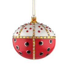 Alessi home ornament in porcelain, hand decorated as a royal embellished lady bug (front side).