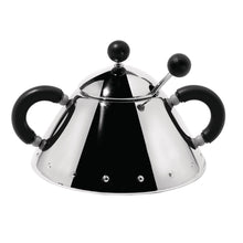 Polished stainless steel sugar bowl with spoon and lid designed by Michael Graves. Has a black polyamide handle and lid knob.
