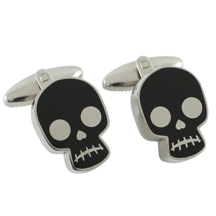 Silver-plated cast alloy with enamel inlay cuff links with the design of Skulls by Frida Kahlo.