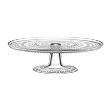 Clear cake stand by Iittala with dew drop design. 12.5 inches in diameter.