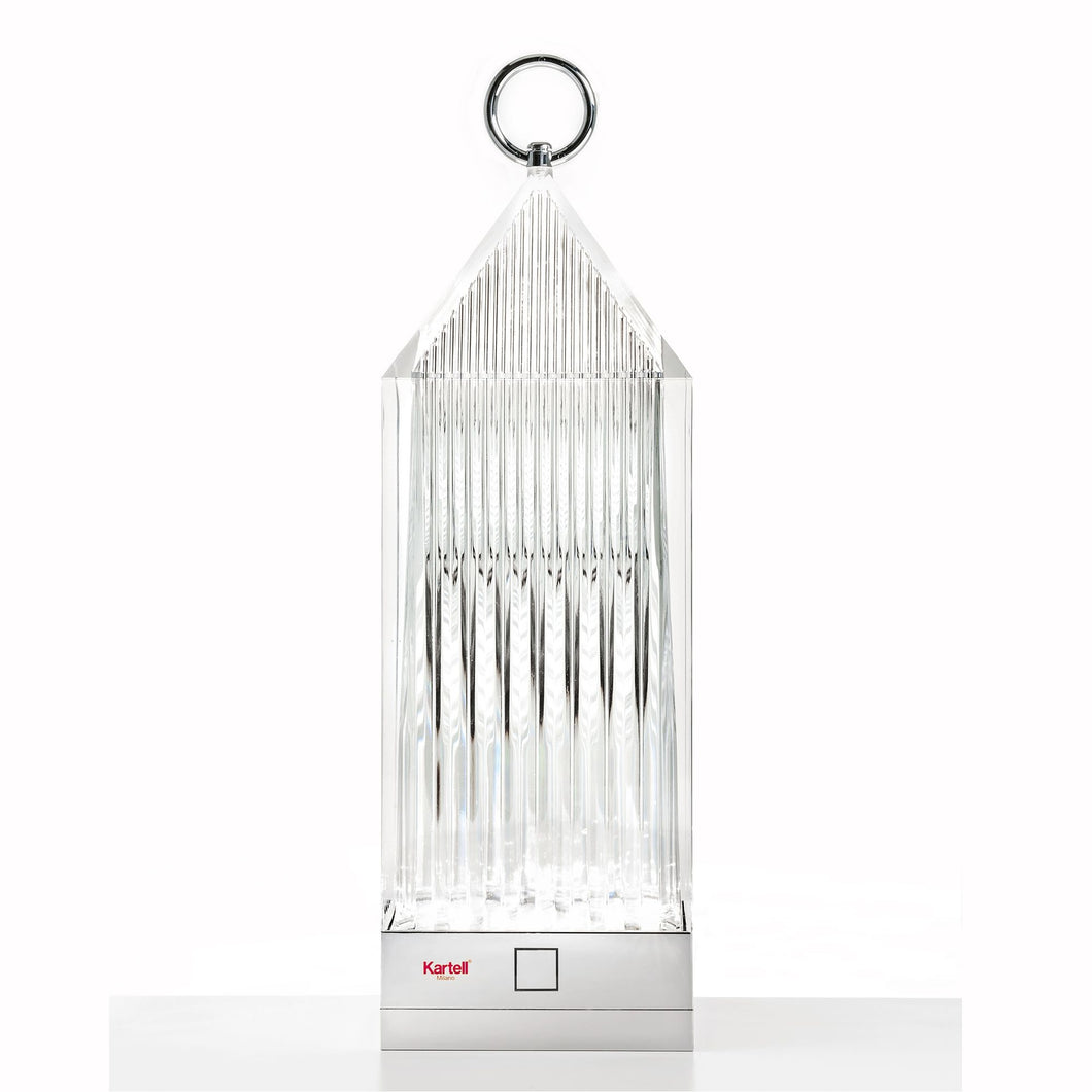 Kartell LED lantern light in crystal color with charging base.