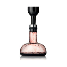 A glass carafe that will oxygenate wine and hold as a serving vessel. May also be used to pour wine back into the bottle after oxygenating. 