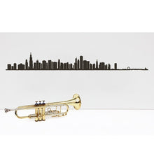 19.5” long steel sheet designed to show off the city skyline in Chicago. Finished in black. The silhouette is meant to be mounted on the wall. 