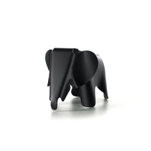Black plastic elephant designed by Charles and Ray Eames.
