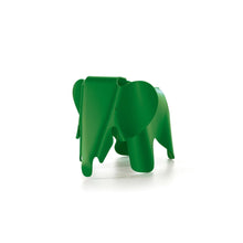 Green plastic elephant designed by Charles and Ray Eames.