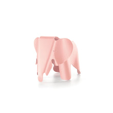 Pink plastic elephant designed by Charles and Ray Eames.