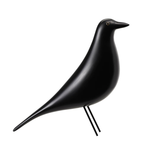 A decorative bird designed for the house by Charles and Ray Eames. Made from black lacquered Alder wood and steel wire.