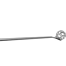 Stainless steel honey dipper in the shape of a honey comb.