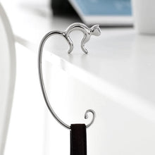 Alessi Minou Purse hook in 18/10 stainless steel mirror polished.
