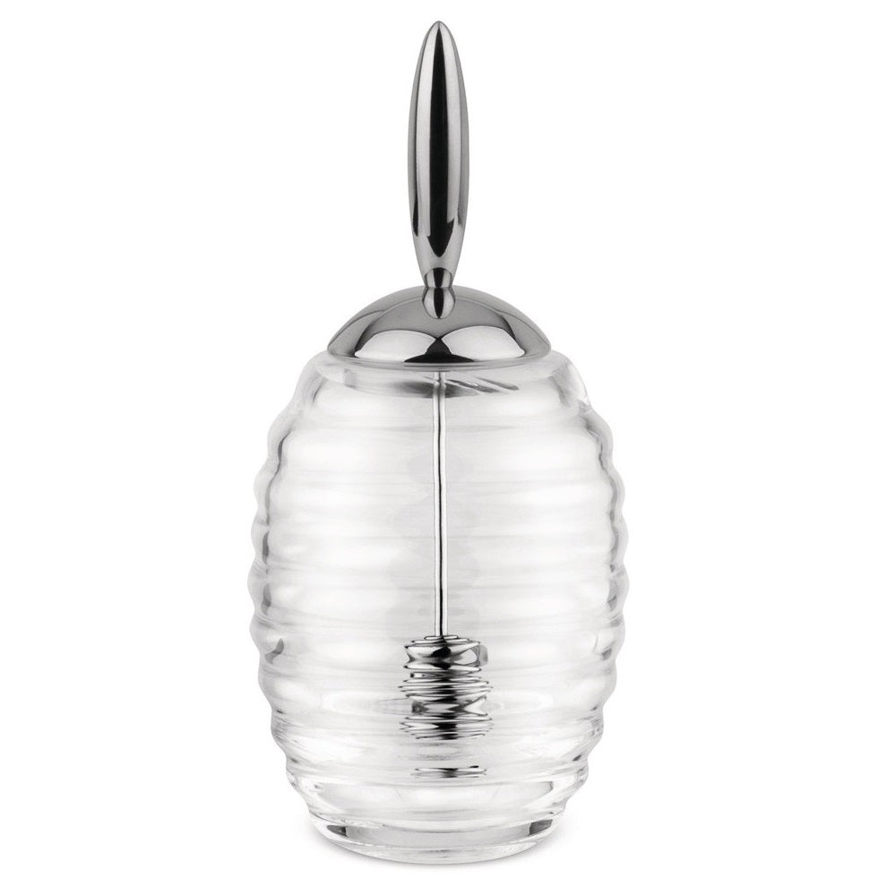 Honey pot in crystalline glass with dipper and lid in stainless steel mirror polished.