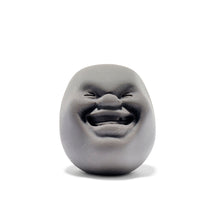Stress ball with a funny face designed by Makiko Yoshida. Hand made in Japan.