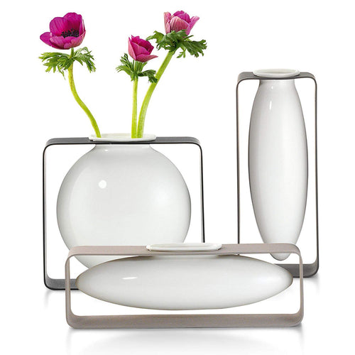 Porcelain vase with powder coated steel frame