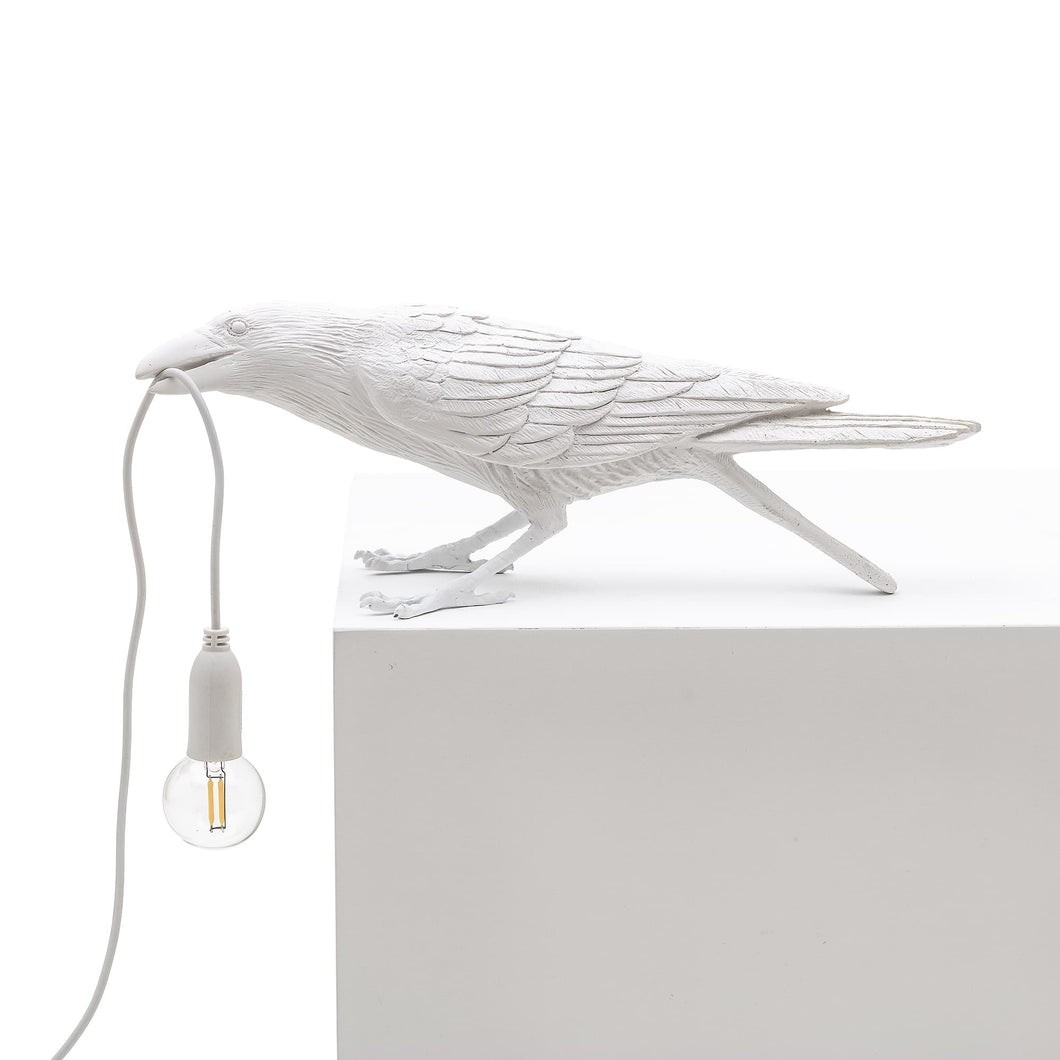 seletti bird lamp playing