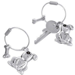 Key ring with a dog design in cast metal.